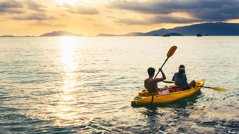 Woman in scenic waters